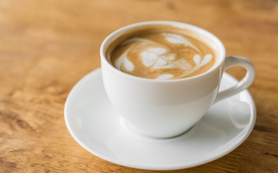 Latte Coffee art on the wooden table