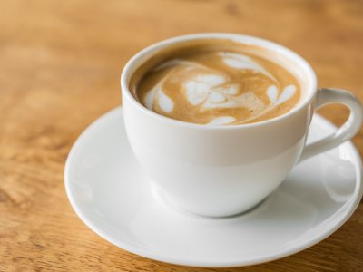 Latte Coffee art on the wooden table