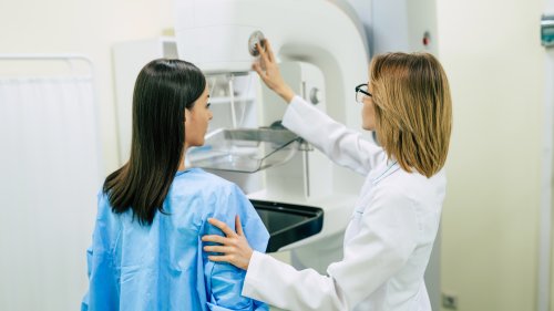 Young woman is having mammography examination at the hospital or private clinic with a professional female doctor.